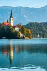 Slovenia, Bled, Lake Bled. Town and island church reflect in lake. Art Print